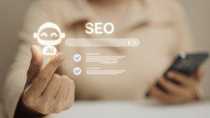 A hand presenting a glowing, futuristic interface featuring the text "SEO" above a search bar and a small robotic AI icon, symbolizing the integration of AI tools for search optimization.